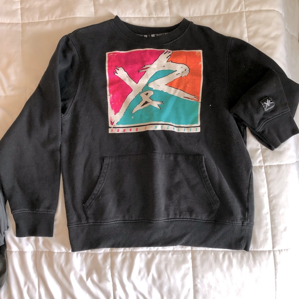 Young and reckless sweater